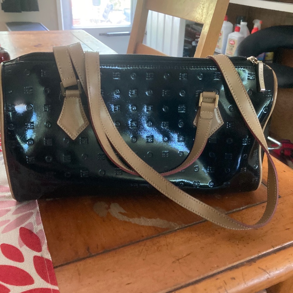 Arcadia Made in Italy Patent and Vachetta Leather Barrel Bag